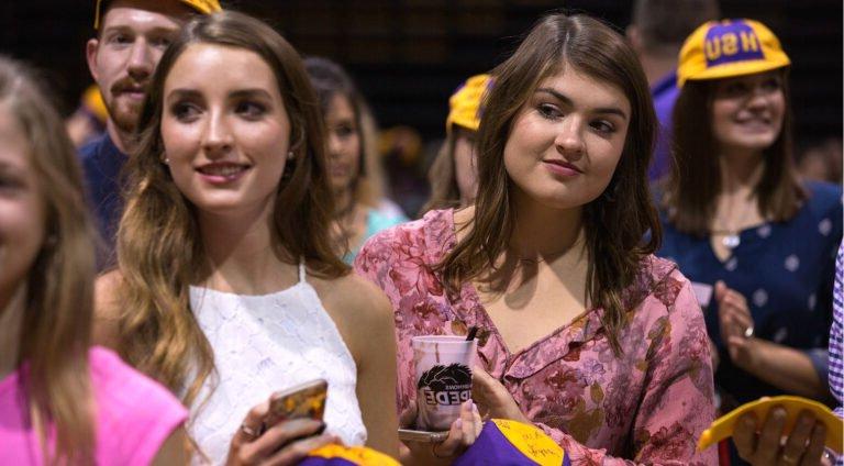 Students participate in a Stampede event.